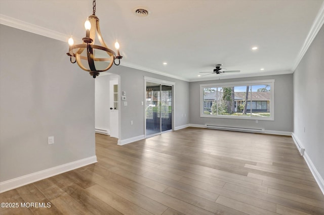 interior space with visible vents, a baseboard radiator, ornamental molding, and ceiling fan with notable chandelier