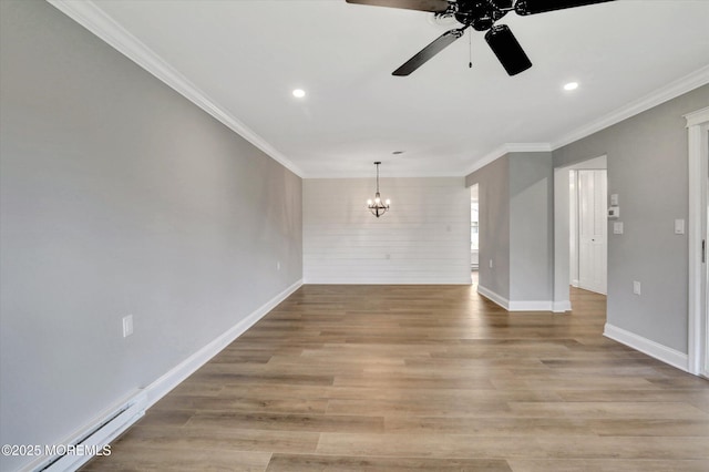 interior space with recessed lighting, light wood-style flooring, ceiling fan with notable chandelier, and baseboards