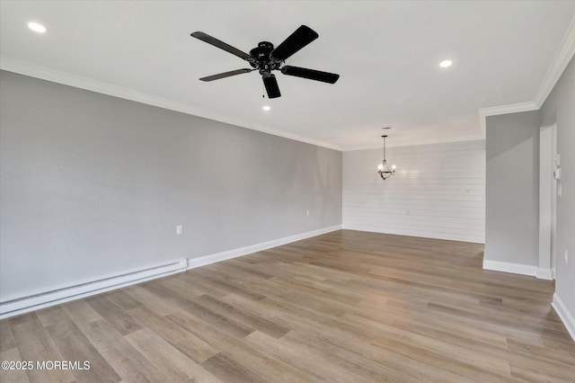 unfurnished room with a baseboard radiator, ceiling fan with notable chandelier, ornamental molding, and recessed lighting