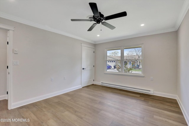 spare room featuring baseboard heating, baseboards, recessed lighting, light wood-style flooring, and ceiling fan