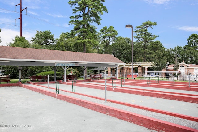 surrounding community featuring fence