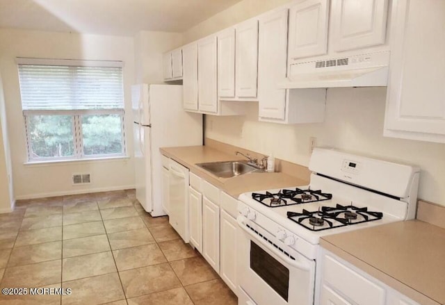 96 Drew Ct, Manalapan, NJ 07726 - kitchen with visible vents, a sink, white appliances, under cabinet range hood, and white cabinetry