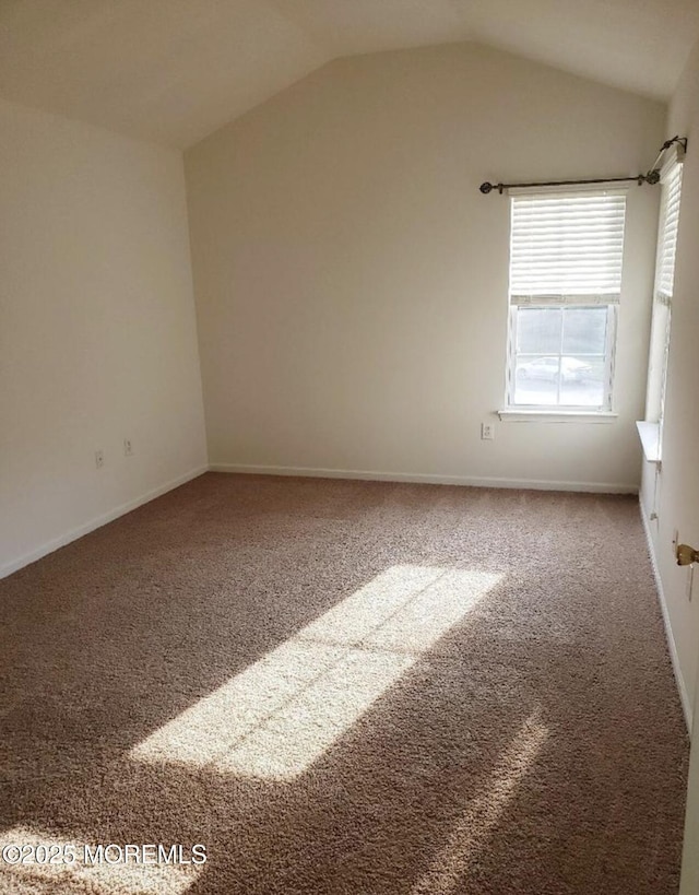 96 Drew Ct, Manalapan, NJ 07726 - unfurnished room featuring carpet flooring, baseboards, and lofted ceiling