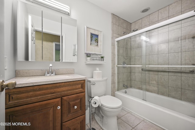 full bathroom featuring shower / bathing tub combination, tile patterned floors, vanity, and toilet