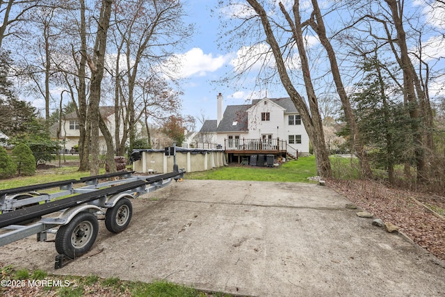 view of yard with a wooden deck