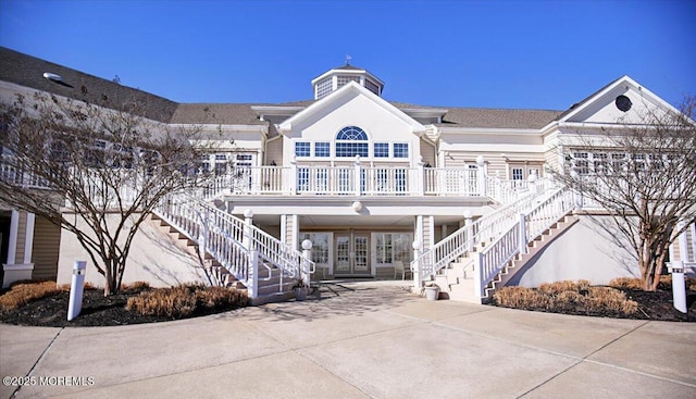 view of property with stairway