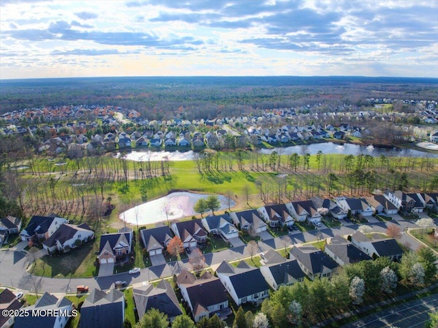 aerial view with a water view and a residential view