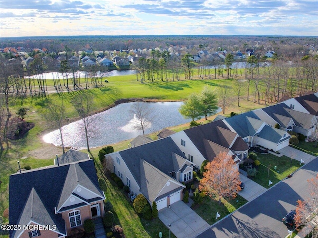 aerial view with a water view and a residential view