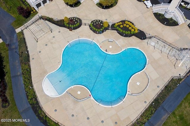 community pool featuring a patio