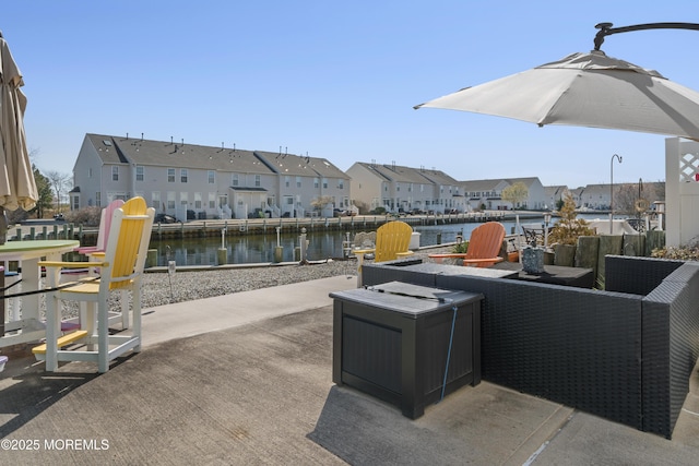33 Blue Heron Ln, Bayville, NJ 08721 - view of patio / terrace with a residential view, a water view, and an outdoor fire pit