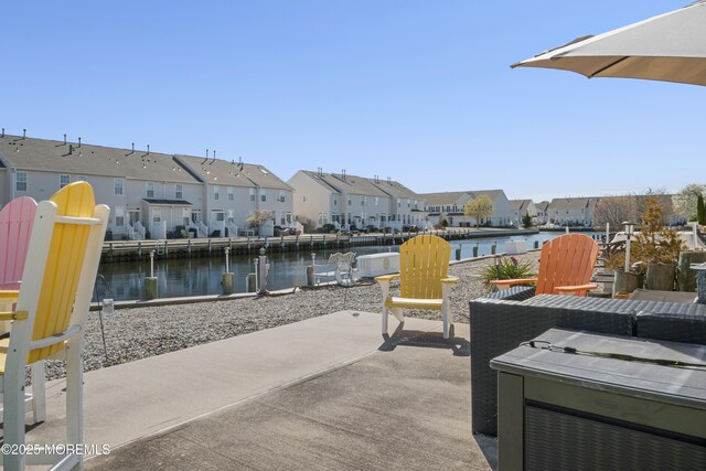 33 Blue Heron Ln, Bayville, NJ 08721 - view of patio / terrace with a residential view and a water view