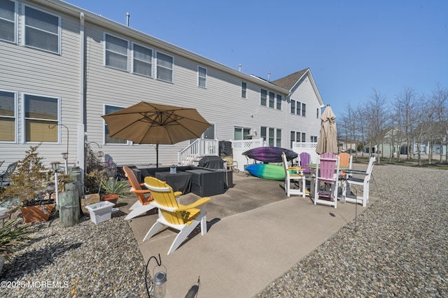 33 Blue Heron Ln, Bayville, NJ 08721 - back of property with a patio