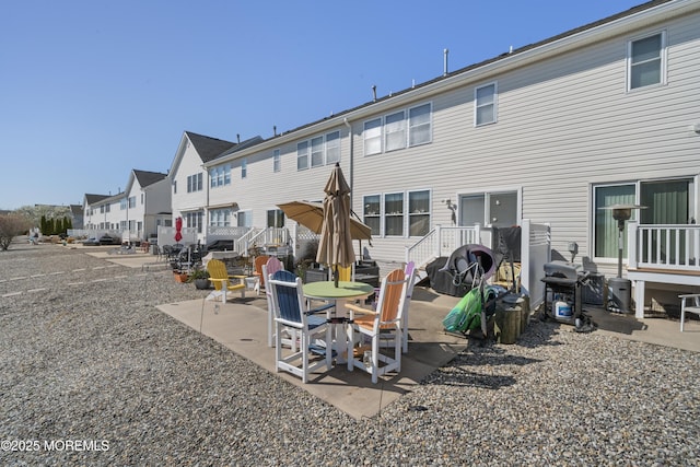 33 Blue Heron Ln, Bayville, NJ 08721 - rear view of house with a residential view and a patio