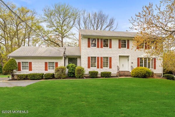 36 New Monmouth Rd, Middletown, NJ 07748 - colonial house with a front lawn