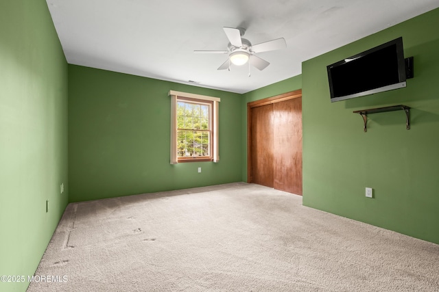 36 New Monmouth Rd, Middletown, NJ 07748 - unfurnished bedroom featuring carpet flooring, a closet, and a ceiling fan