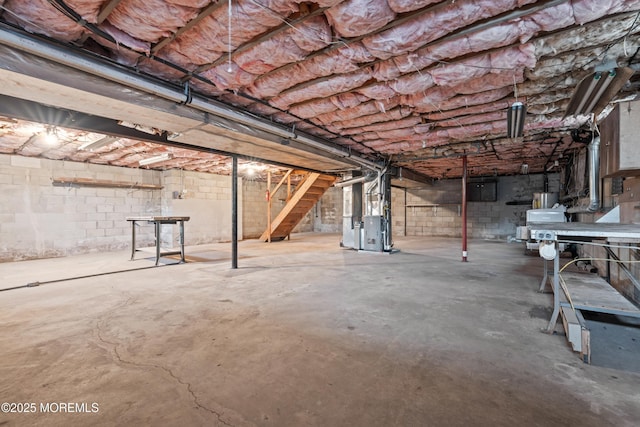 36 New Monmouth Rd, Middletown, NJ 07748 - unfinished basement with stairway and heating unit