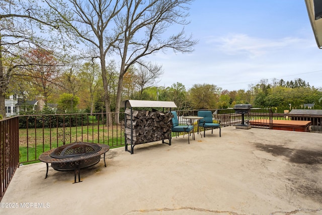 36 New Monmouth Rd, Middletown, NJ 07748 - view of patio with an outdoor fire pit, a jacuzzi, and area for grilling