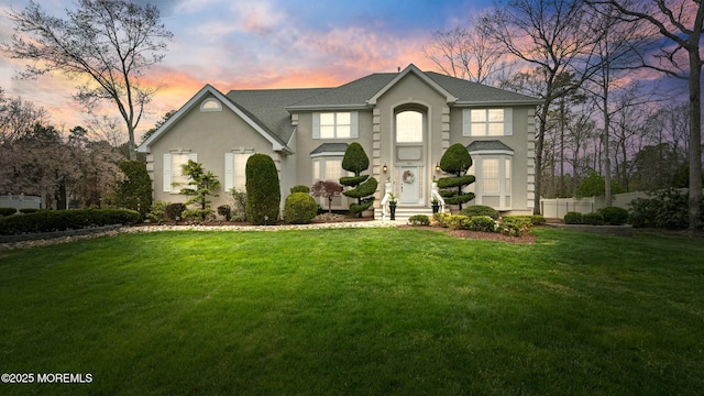 101 Erin Dr, Jackson, NJ 08527 - view of front of home with a yard, roof with shingles, and stucco siding