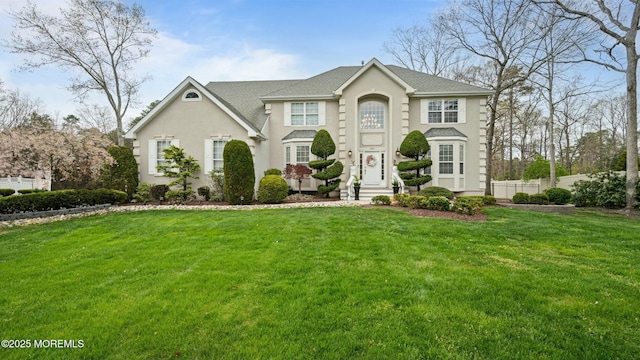 101 Erin Dr, Jackson, NJ 08527 - view of front of property featuring a shingled roof, a front lawn, and stucco siding