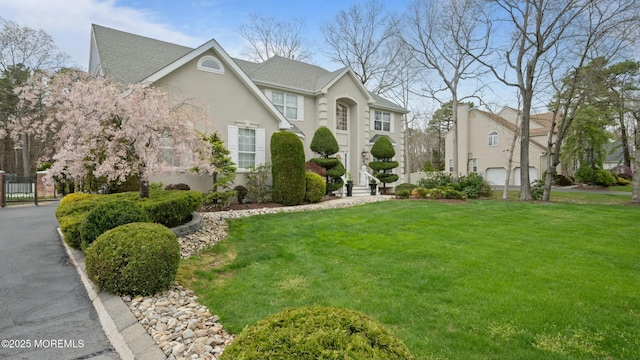 101 Erin Dr, Jackson, NJ 08527 - view of front facade with a front lawn and stucco siding