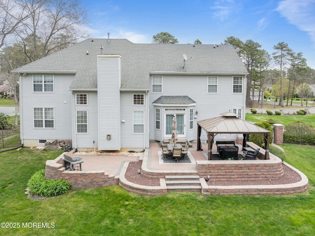 101 Erin Dr, Jackson, NJ 08527 - rear view of house with roof with shingles, a gazebo, a chimney, a patio area, and a lawn