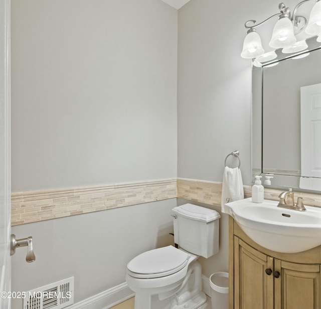 101 Erin Dr, Jackson, NJ 08527 - bathroom featuring toilet, tile walls, visible vents, a chandelier, and vanity