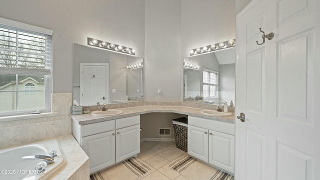 101 Erin Dr, Jackson, NJ 08527 - bathroom featuring a bath, a sink, visible vents, and double vanity