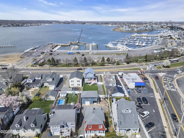 drone / aerial view featuring a water view