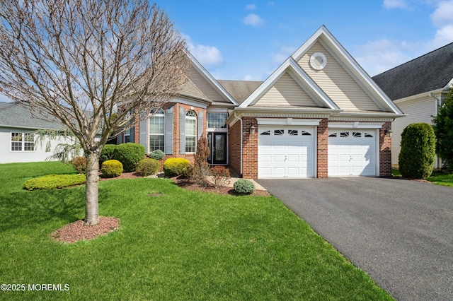 7 Riviera Dr, Monroe, NJ 08831 - view of front of home featuring brick siding, a front yard, a garage, and driveway