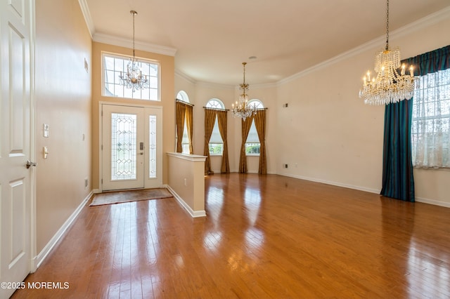 7 Riviera Dr, Monroe, NJ 08831 - entrance foyer with a chandelier, hardwood / wood-style flooring, and a healthy amount of sunlight