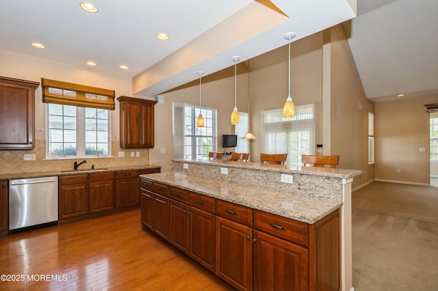 7 Riviera Dr, Monroe, NJ 08831 - kitchen with tasteful backsplash, a center island, dishwasher, a sink, and lofted ceiling
