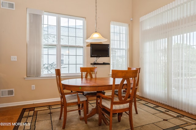 7 Riviera Dr, Monroe, NJ 08831 - dining room with wood finished floors, baseboards, and visible vents