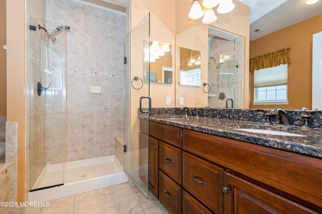 7 Riviera Dr, Monroe, NJ 08831 - full bathroom with a sink, visible vents, double vanity, and a stall shower