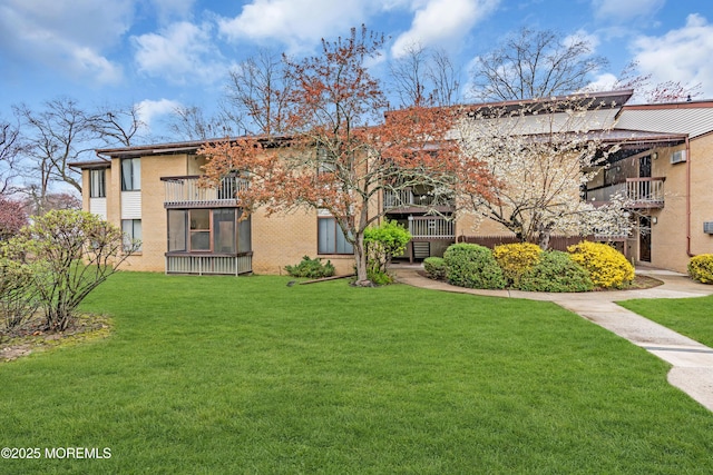 54 Amberly Dr Unit F, Manalapan, NJ 07726 - view of front of property with a front lawn