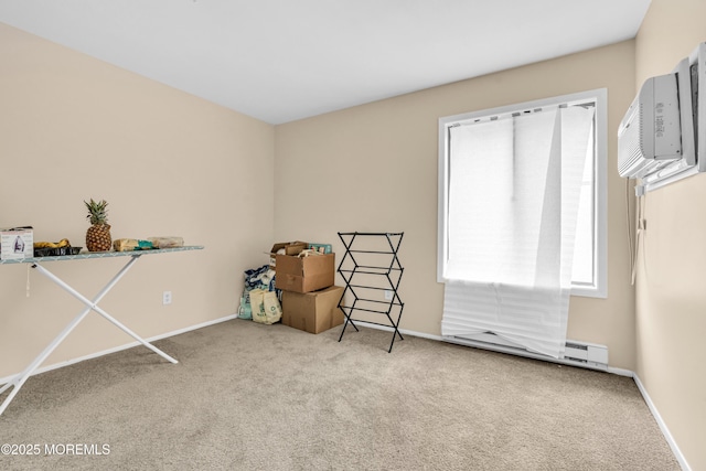 54 Amberly Dr Unit F, Manalapan, NJ 07726 - misc room featuring carpet floors, baseboards, and a wall mounted AC