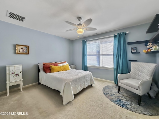 bedroom featuring carpet flooring, baseboards, a ceiling fan, and visible vents