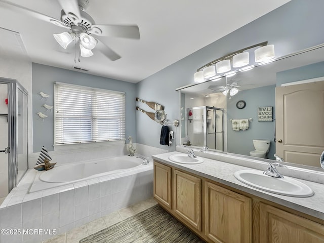 full bath featuring visible vents, a sink, a ceiling fan, and toilet
