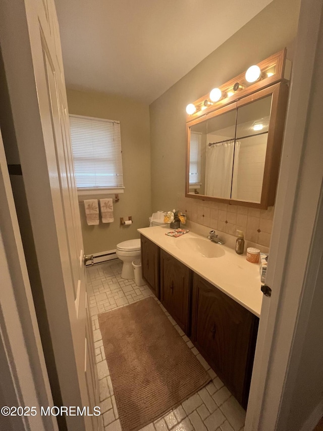 18 Andes Ct, Brick, NJ 08724 - full bathroom featuring vanity, toilet, and baseboard heating