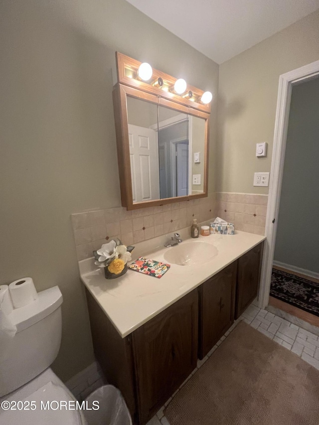 18 Andes Ct, Brick, NJ 08724 - bathroom featuring vanity, toilet, and decorative backsplash