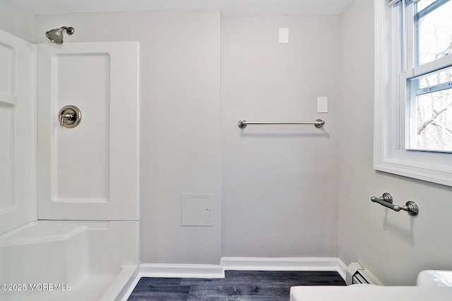 950 Bay Ave, Toms River, NJ 08753 - full bath featuring baseboards, toilet, a shower, wood finished floors, and a baseboard heating unit
