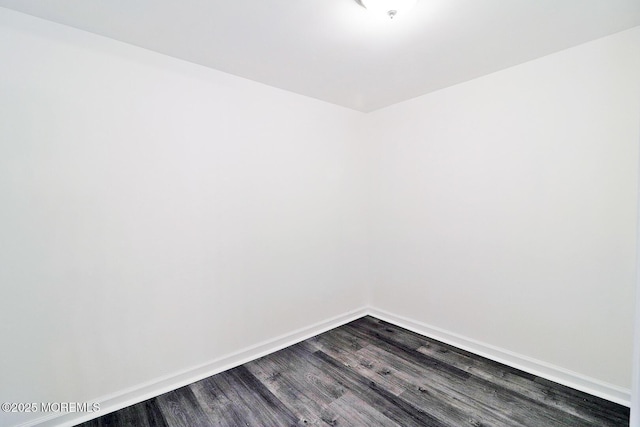 950 Bay Ave, Toms River, NJ 08753 - unfurnished room featuring baseboards and dark wood-style floors