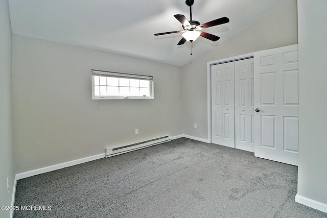 950 Bay Ave, Toms River, NJ 08753 - unfurnished bedroom featuring a closet, carpet floors, lofted ceiling, a baseboard radiator, and baseboards