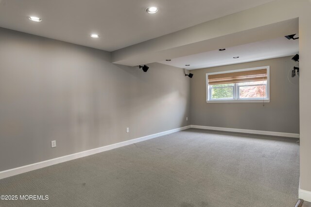 unfurnished room with baseboards, carpet flooring, and recessed lighting
