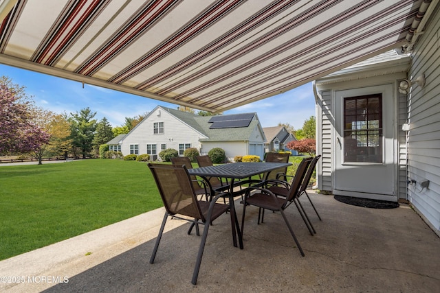 view of patio featuring outdoor dining area