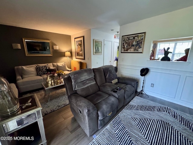 living area with wood finished floors