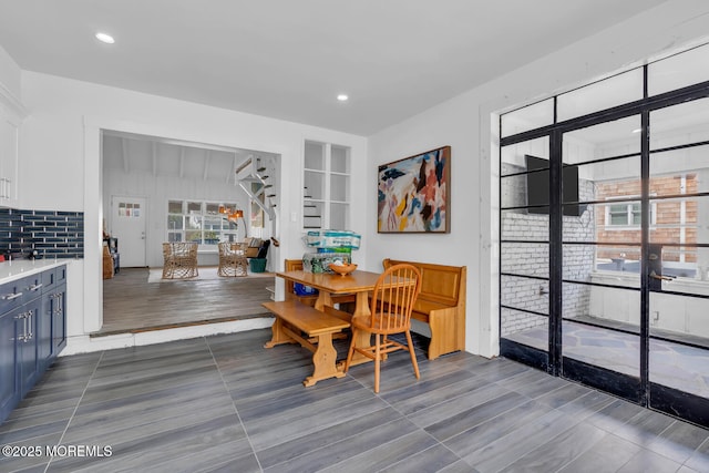 dining room with recessed lighting