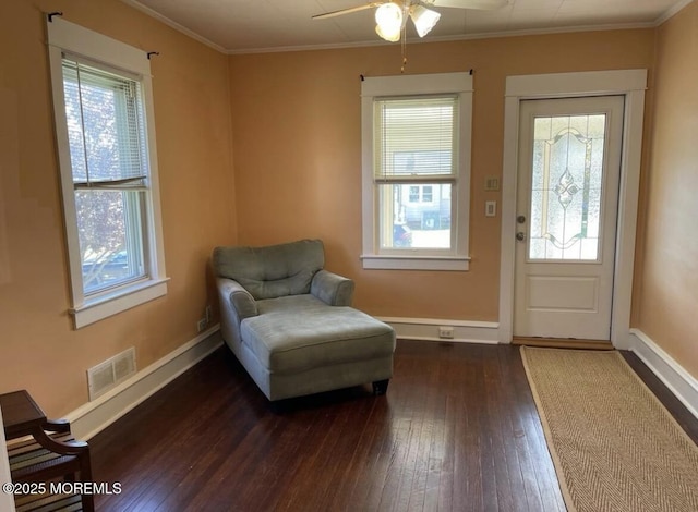 sitting room featuring visible vents, baseboards, ceiling fan, and hardwood / wood-style floors