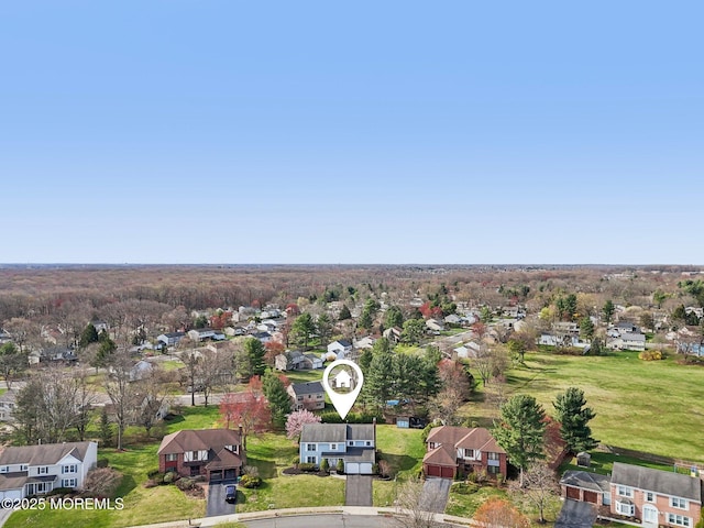 birds eye view of property with a residential view