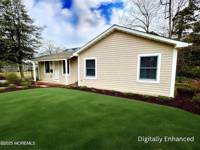 5 Laurel Ave, Toms River, NJ 08753 - view of front facade with a front lawn, fence, and a shingled roof