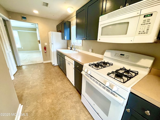 5 Laurel Ave, Toms River, NJ 08753 - kitchen featuring visible vents, a sink, light countertops, white appliances, and light floors